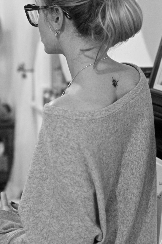 small sun tattoo