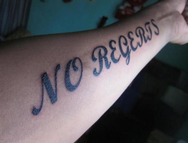 funny tattoo no regrets misspelled