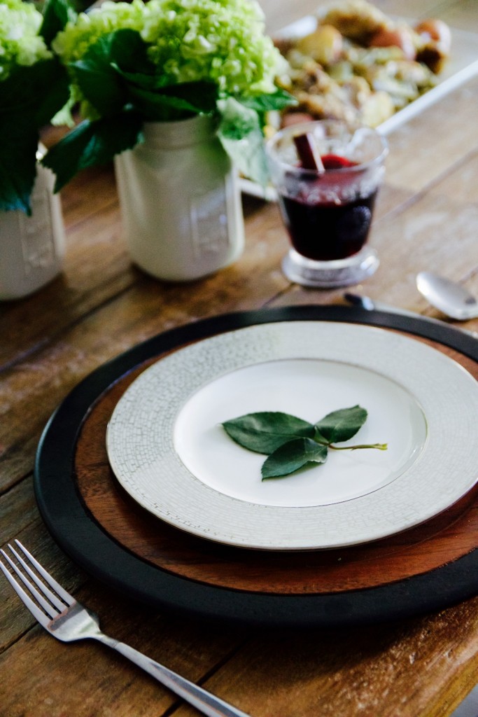 easy place setting of rose leaf trios set on a white and silver plate