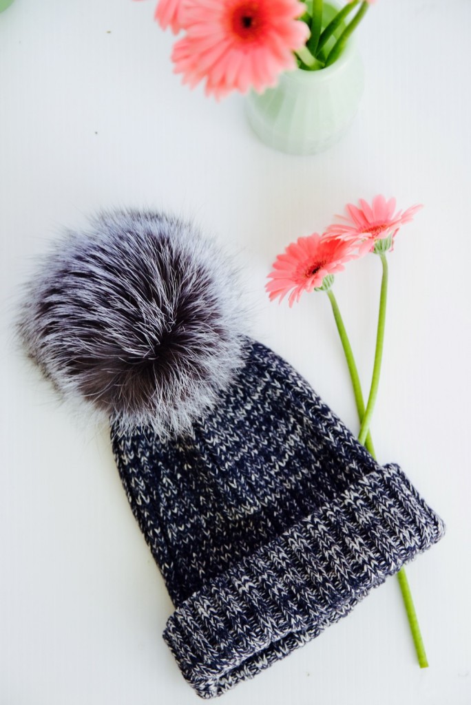Adrienne Landau knit beanie with an oversize pom pom
