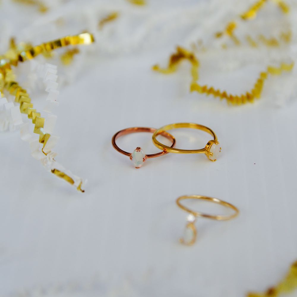 Wren opal stacking rings in rose gold and yellow gold from Iconery