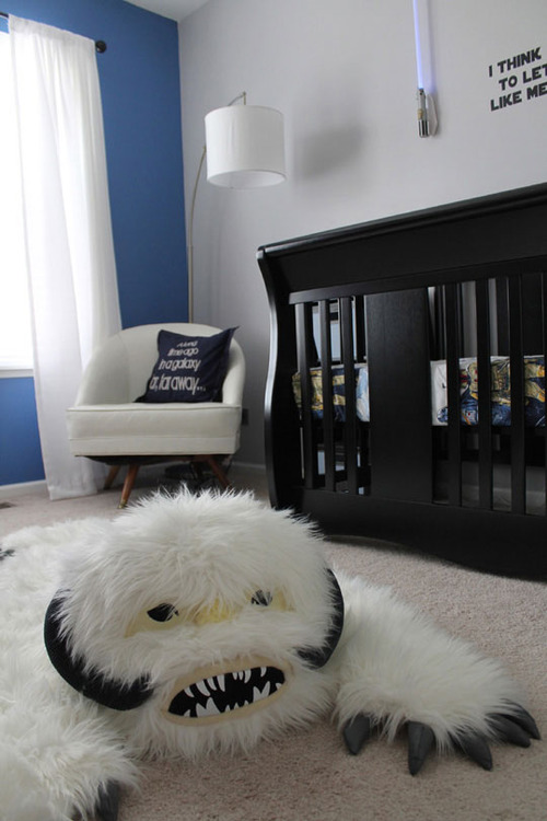 cool nursery for a little boy with a furry rug