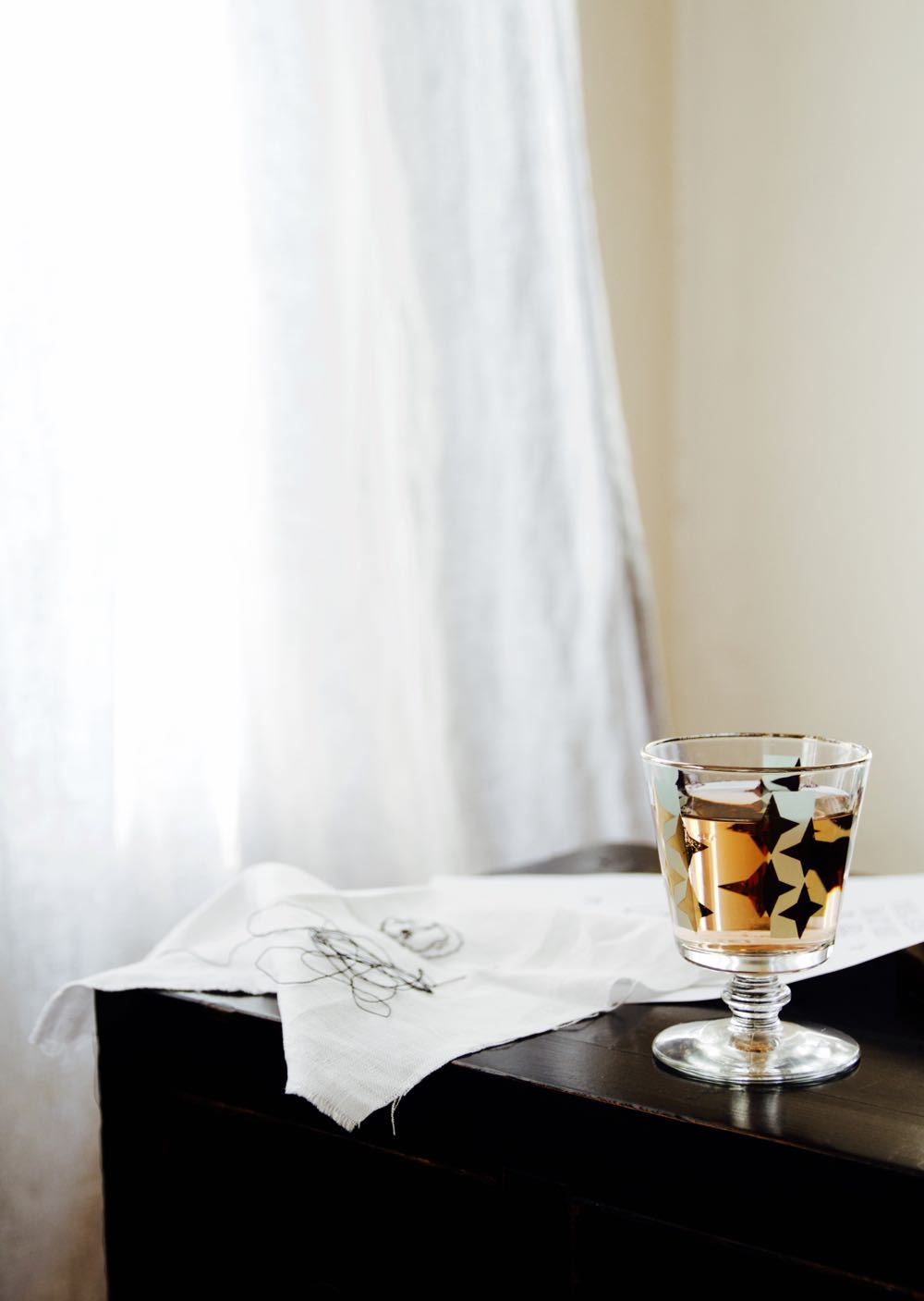 Vintage wine glass with gold rim and gold stars