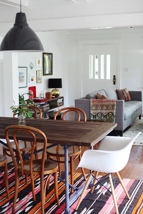 Rustic dining room with mismatched chairs