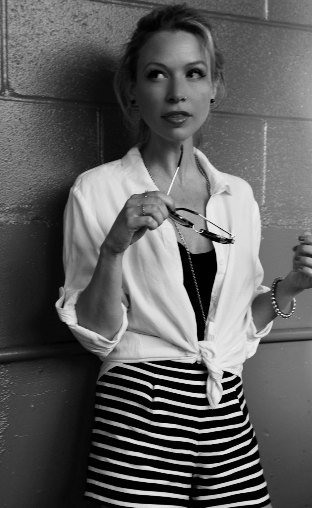 Black and white shot of nautical outfit with striped shorts