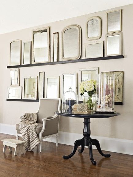 Gallery wall of vintage mirrors