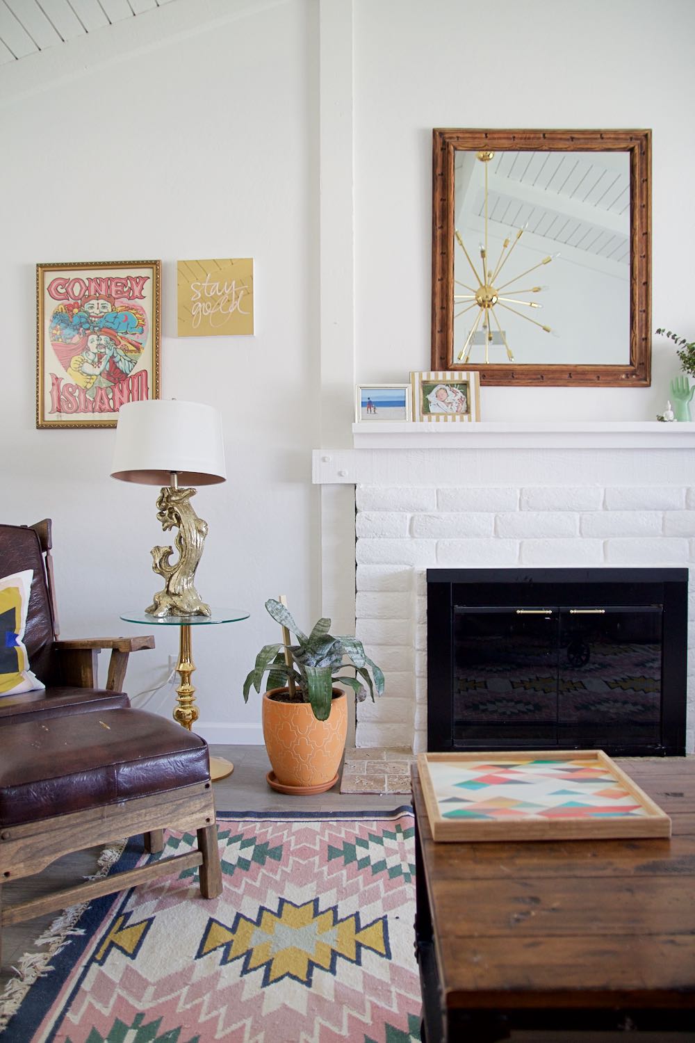 White living room with painted fireplace