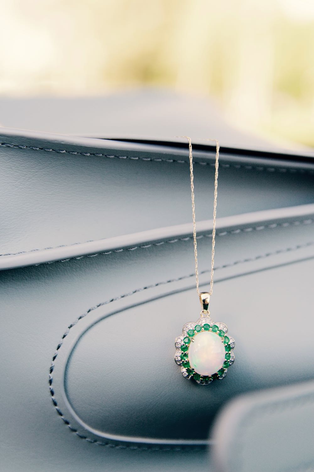 Opal emerald surrounded by diamonds and emeralds from JTV