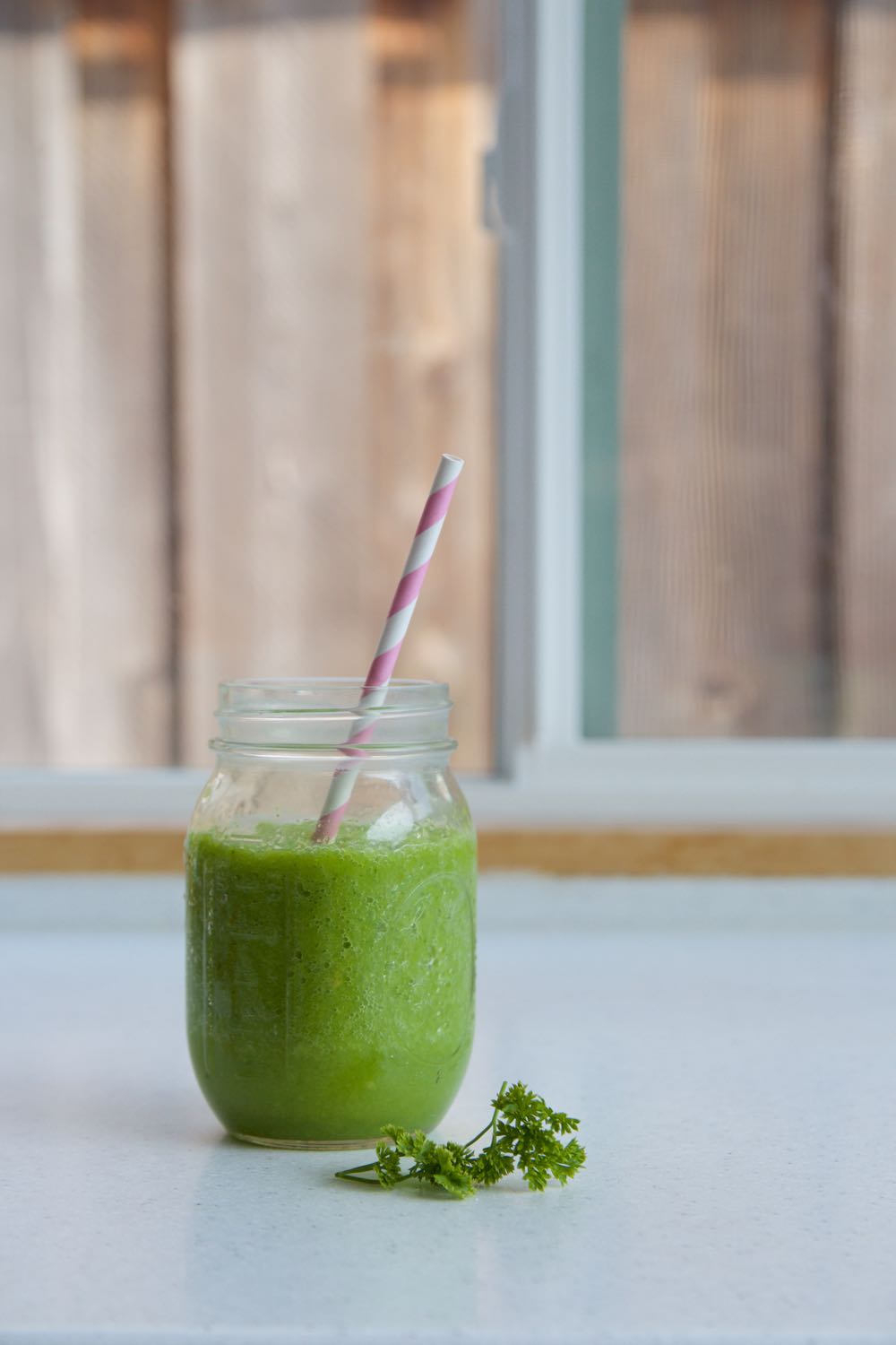 Homemade parsley juice with lemon