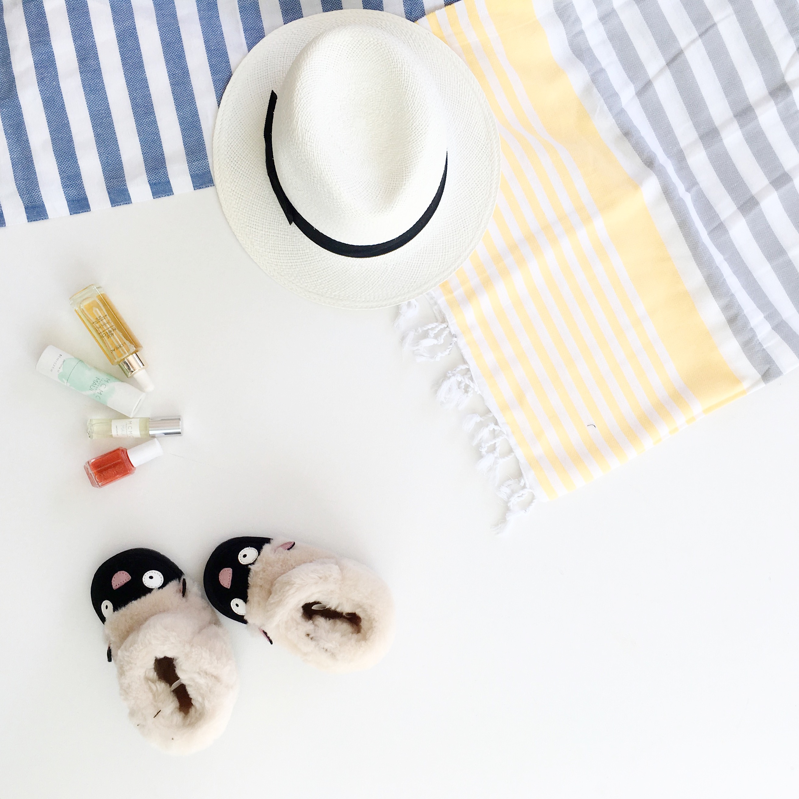 Buji Baja beach throws and cat baby booties