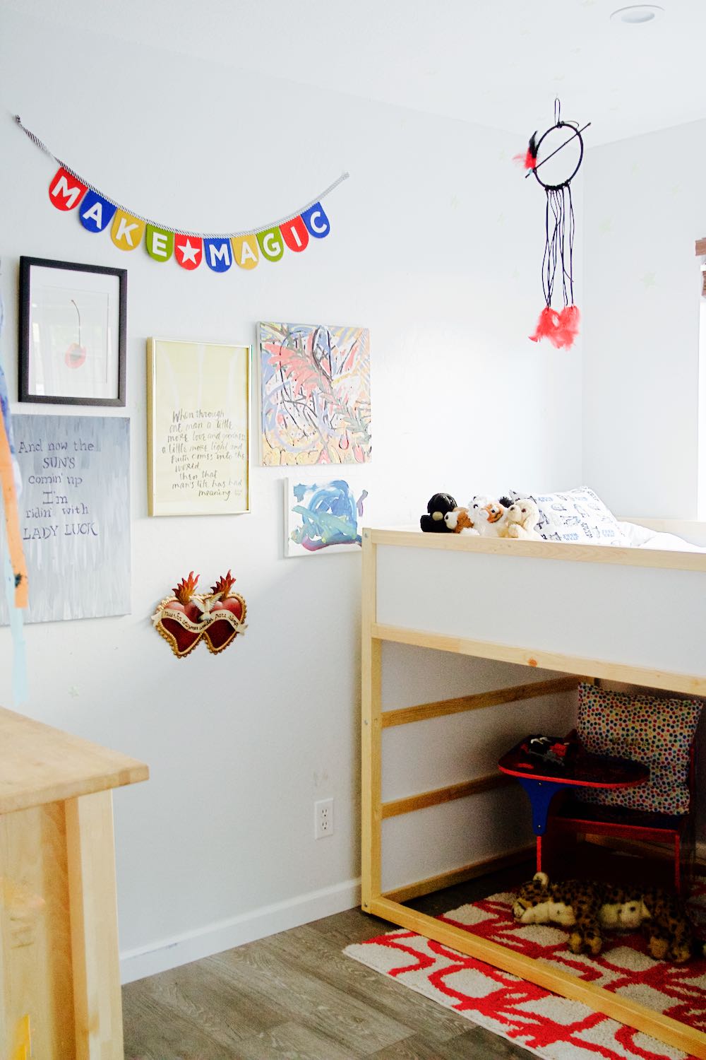 The Ikea Kura bunk bed in a little boy's room