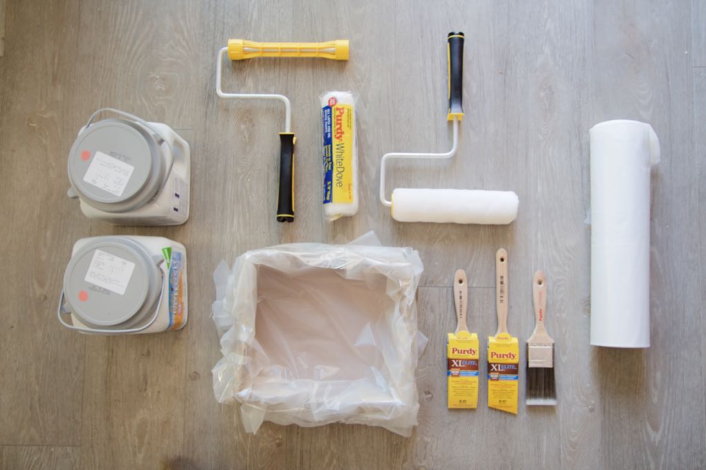 Supplies for painting a small bathroom