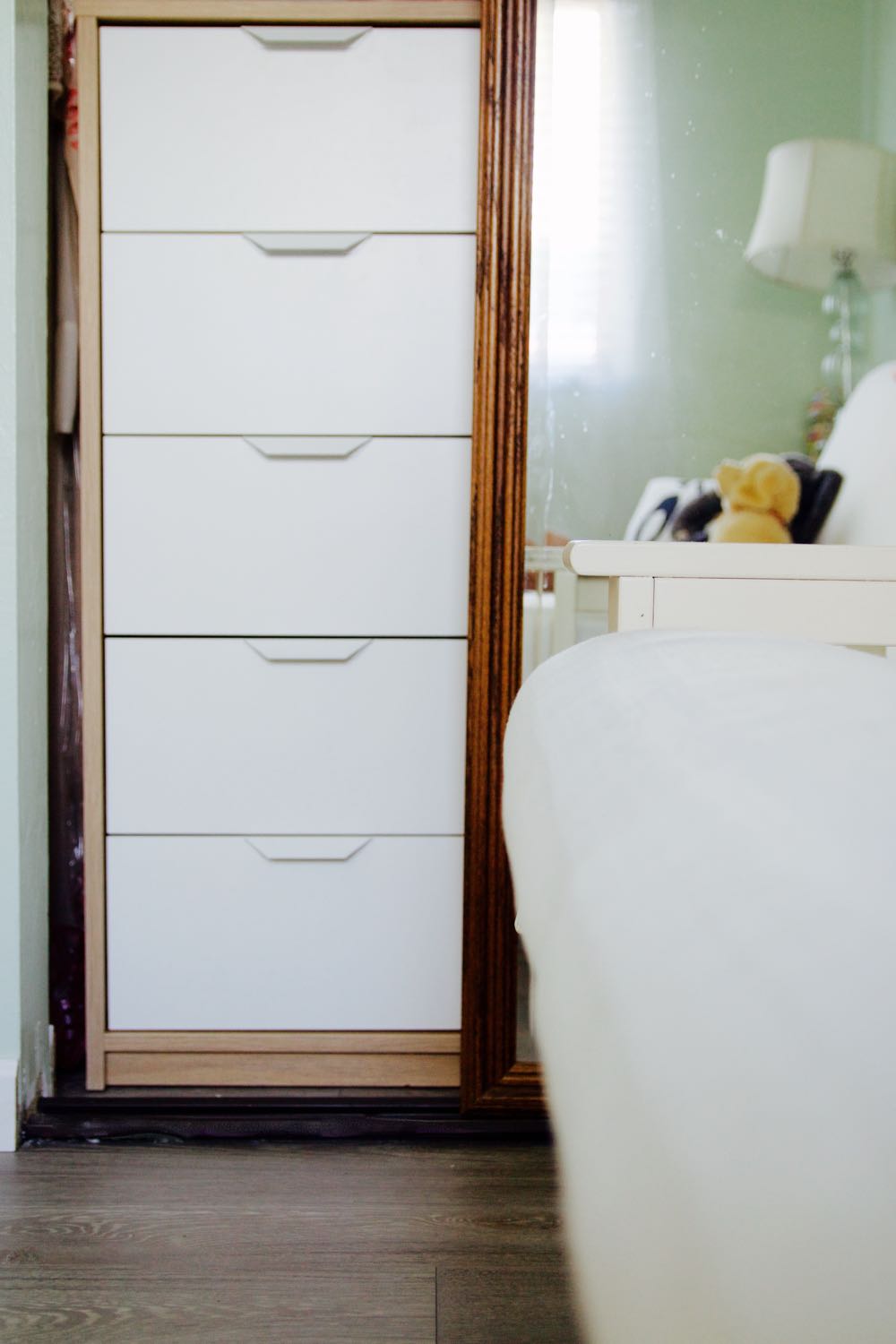 Tall narrow white Ikea dresser