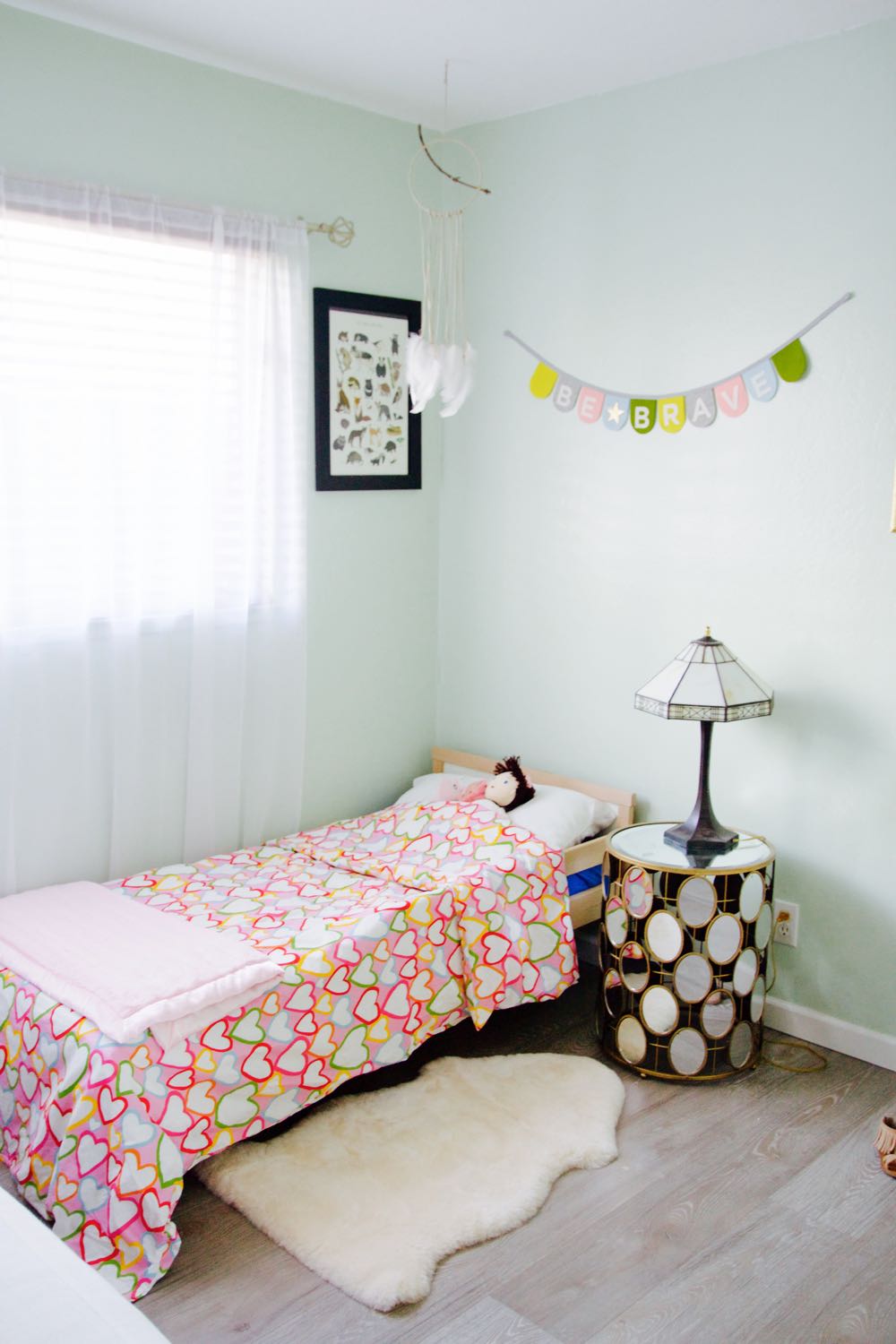 Not too girly little girl's room in pale green and pink