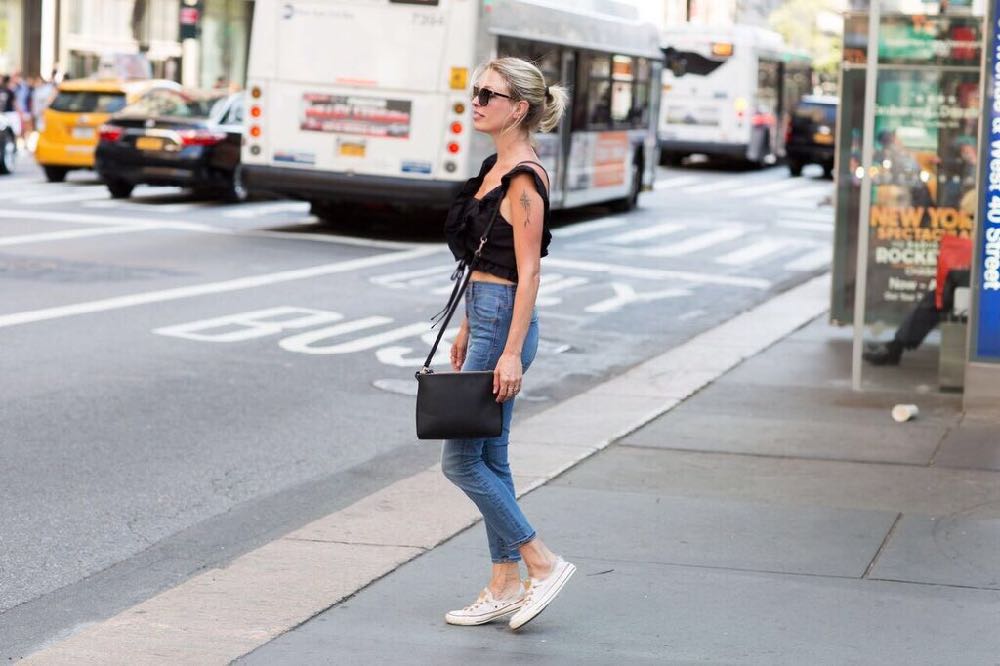 Jordan Reid wearing the Lo & Sons pearl crossbody