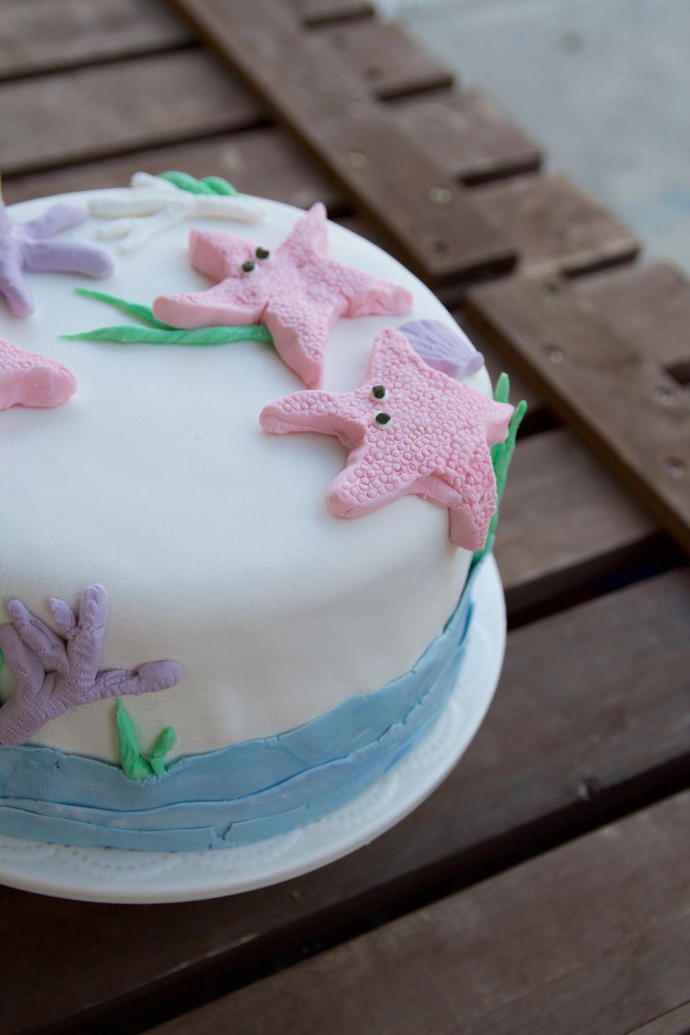 fondant cake with starfish, waves, and octopus