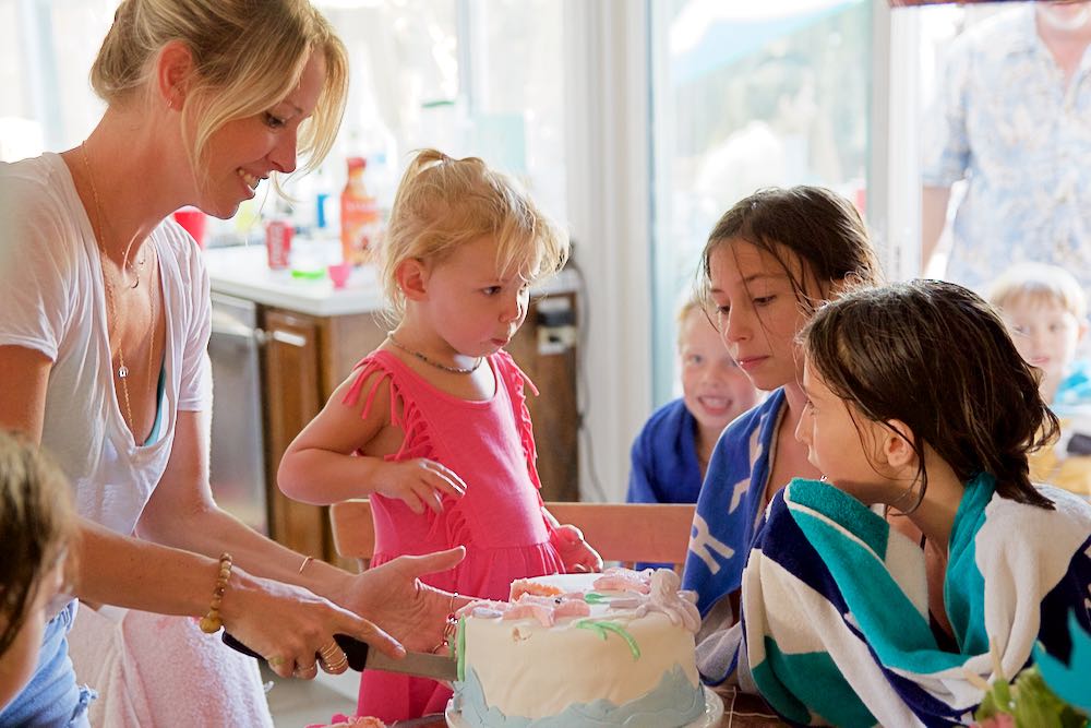 Cutting the cake at the 2nd birthday party