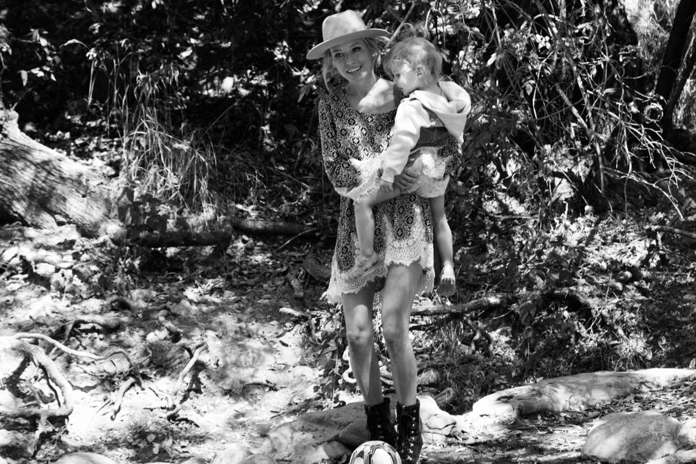 family walk through the woods