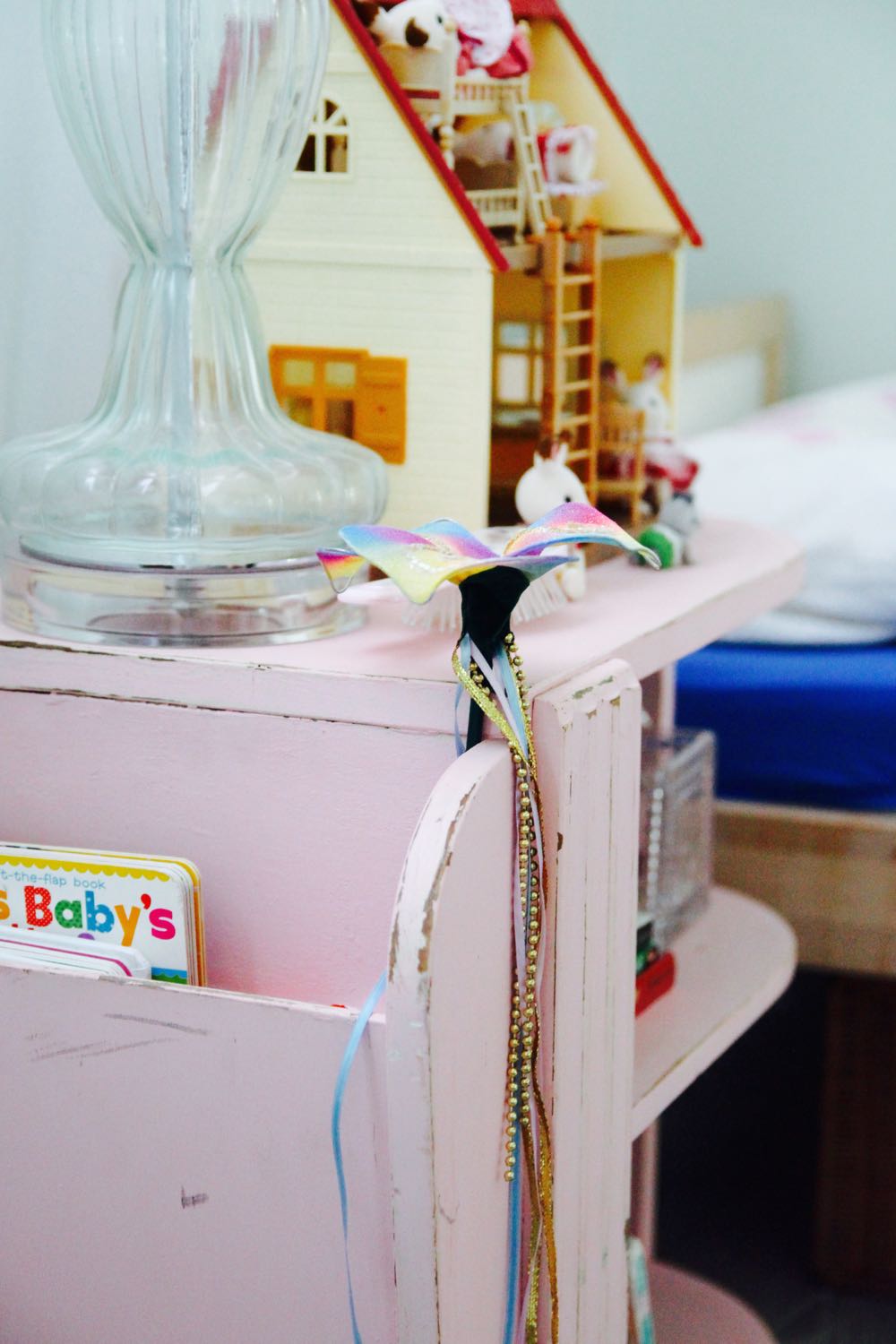 pink midcentury bedside table for a little girl's room