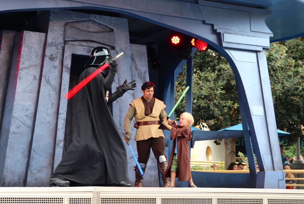 fighting darth vader at the jedi show in disneyland