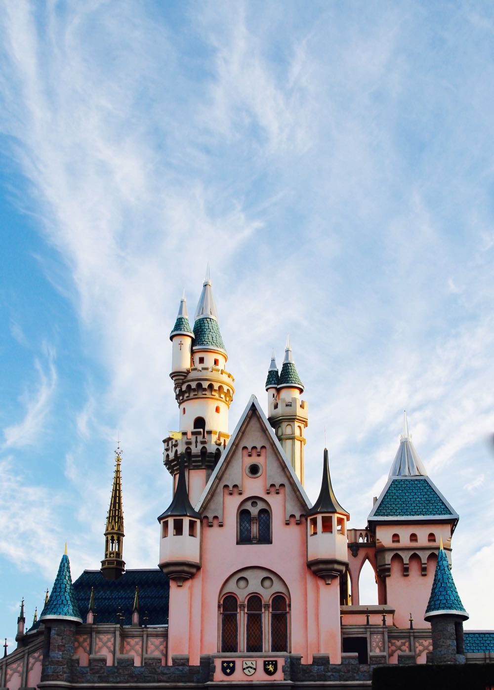 beautiful shot of the disney castle against the sky