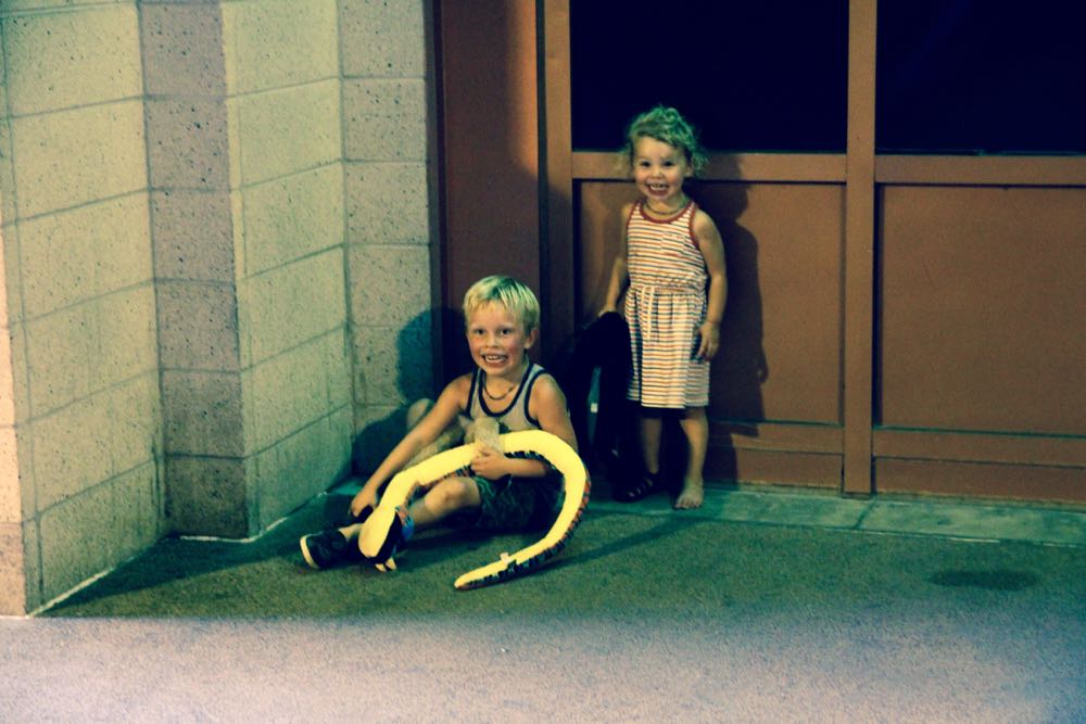 playing with a stuffed snake