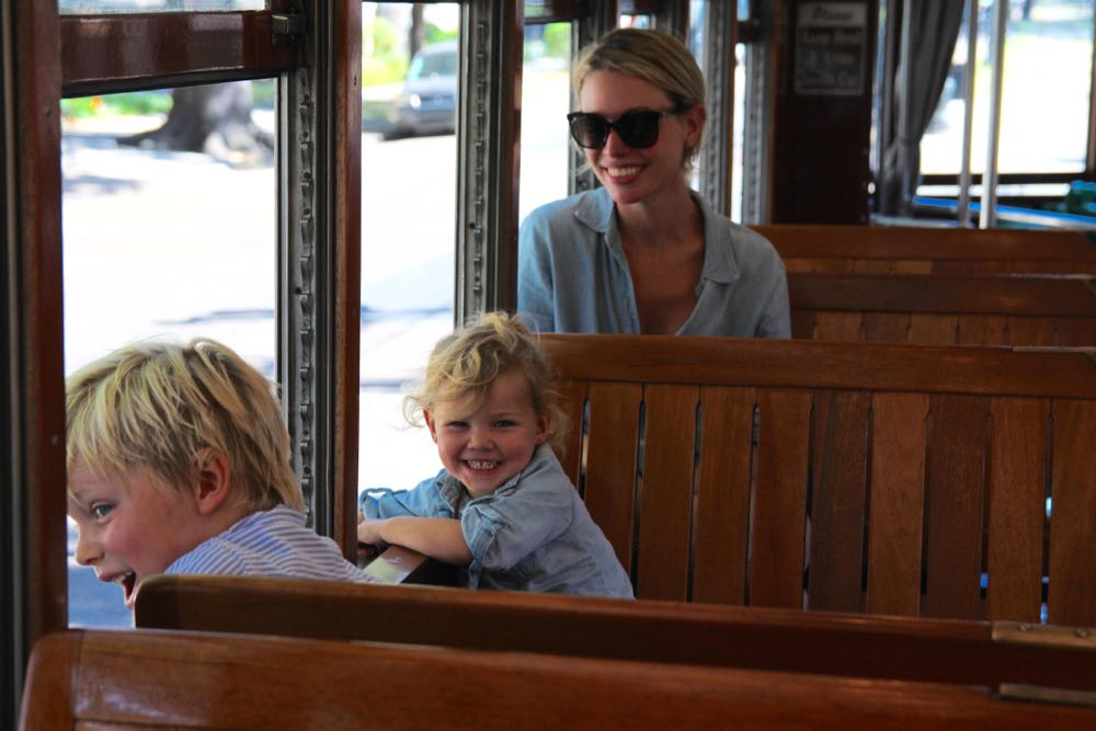 family streetcar ride in new orleans with ramshackle glam