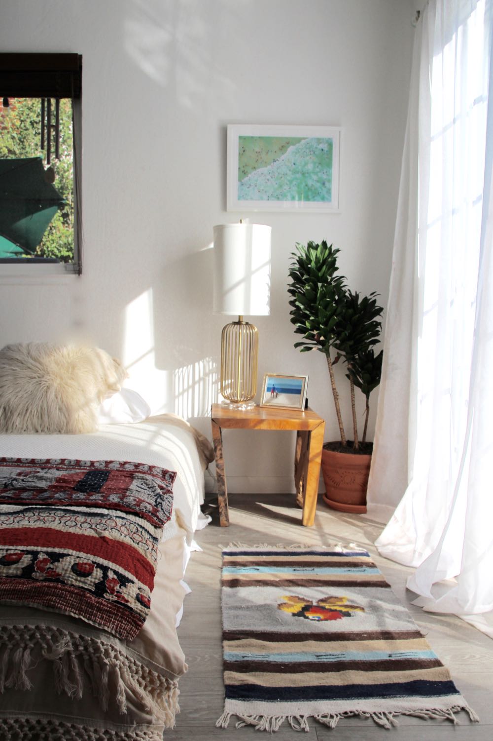 Vintage kantha throw used as a bedspread