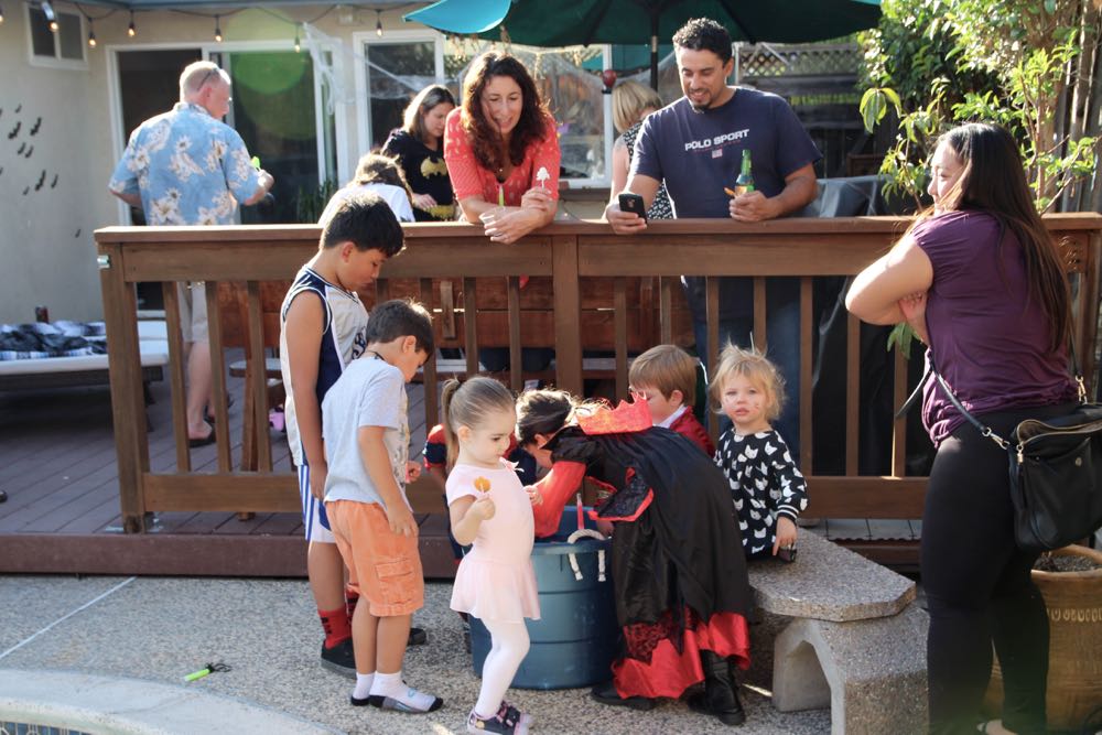 Activity ideas for a kids Halloween party including bobbing with apples