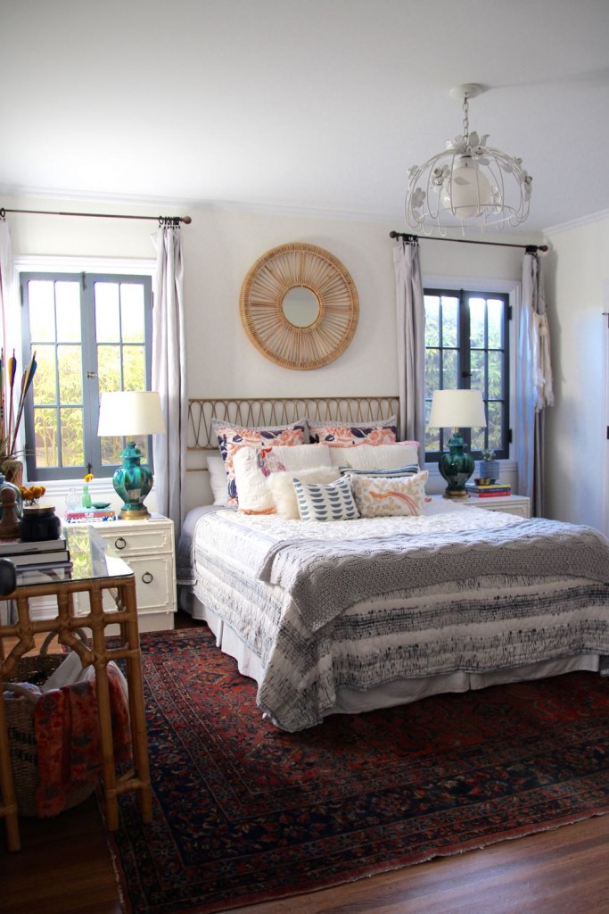 Beautiful boho bedroom with mirror