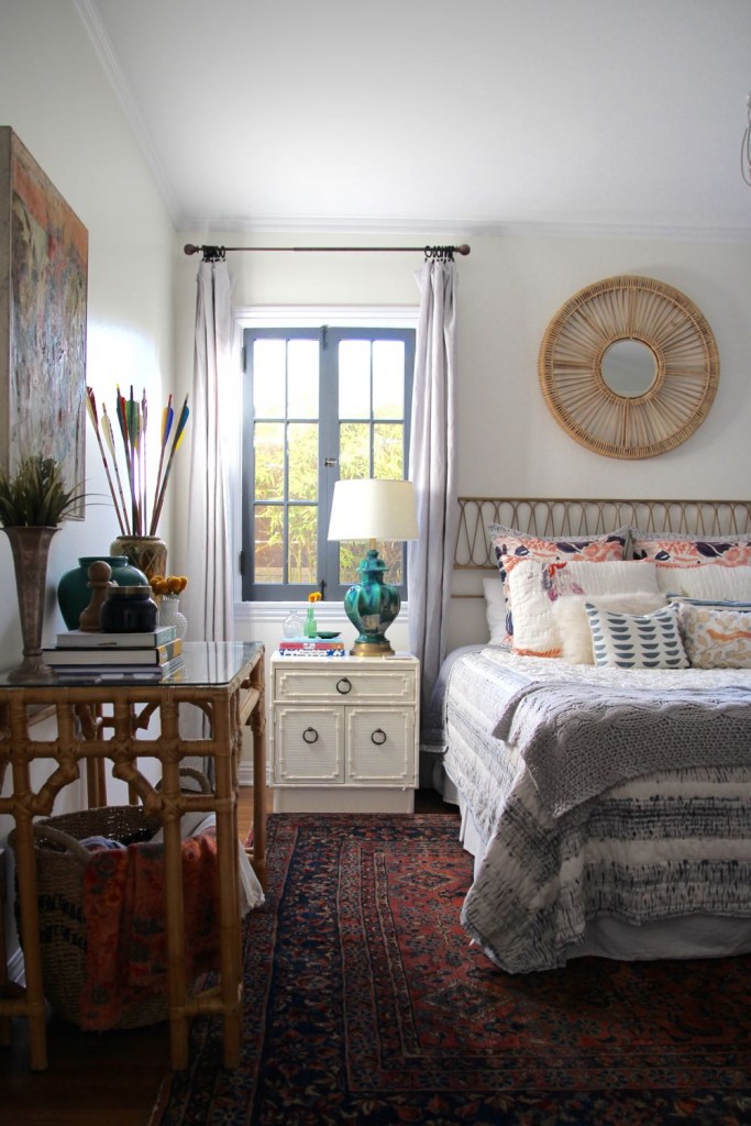 Beautiful boho bedroom with mirror
