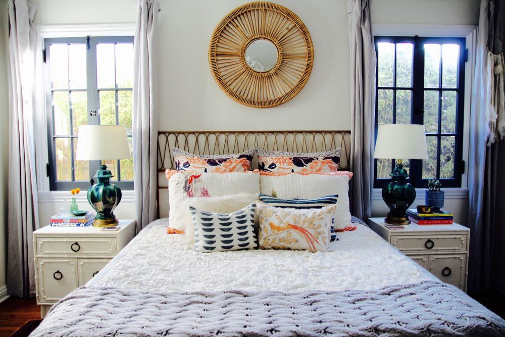 Beautiful boho bedroom with mirror