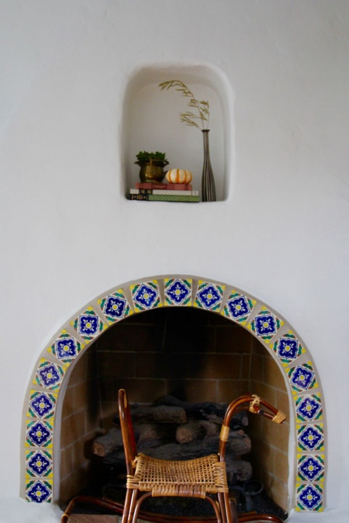 Tiled fireplace in a spanish style home in los angeles