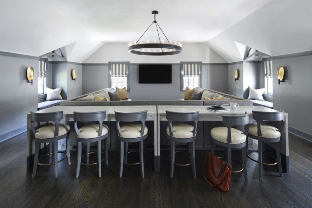 media room with bar and sunken couch area