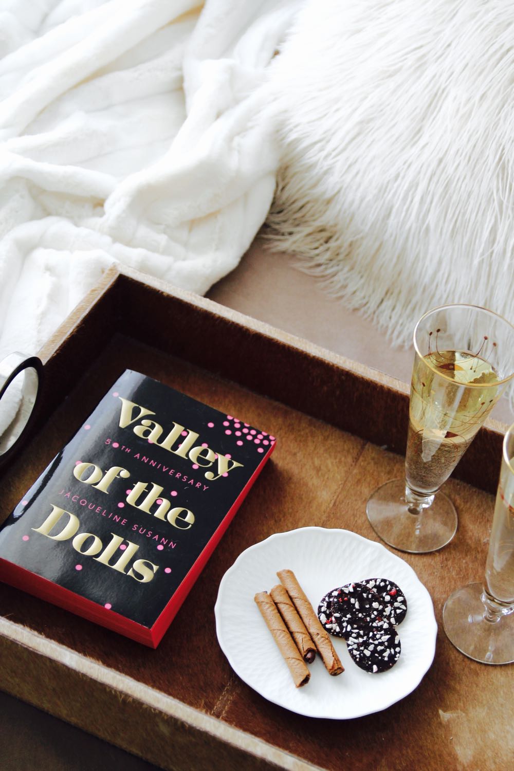 use a tray to hold drinks and books on the couch
