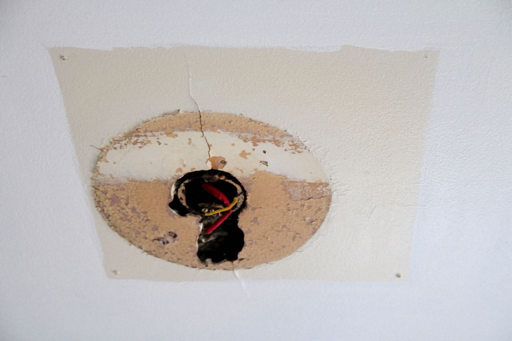 how to repair a medium sized hole in drywall step by step