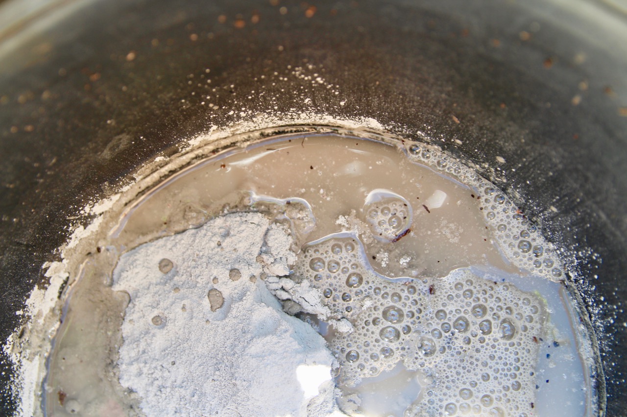 mixing mortar and water to make cement