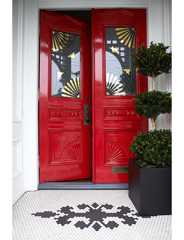 red Art Deco style door with gold and black