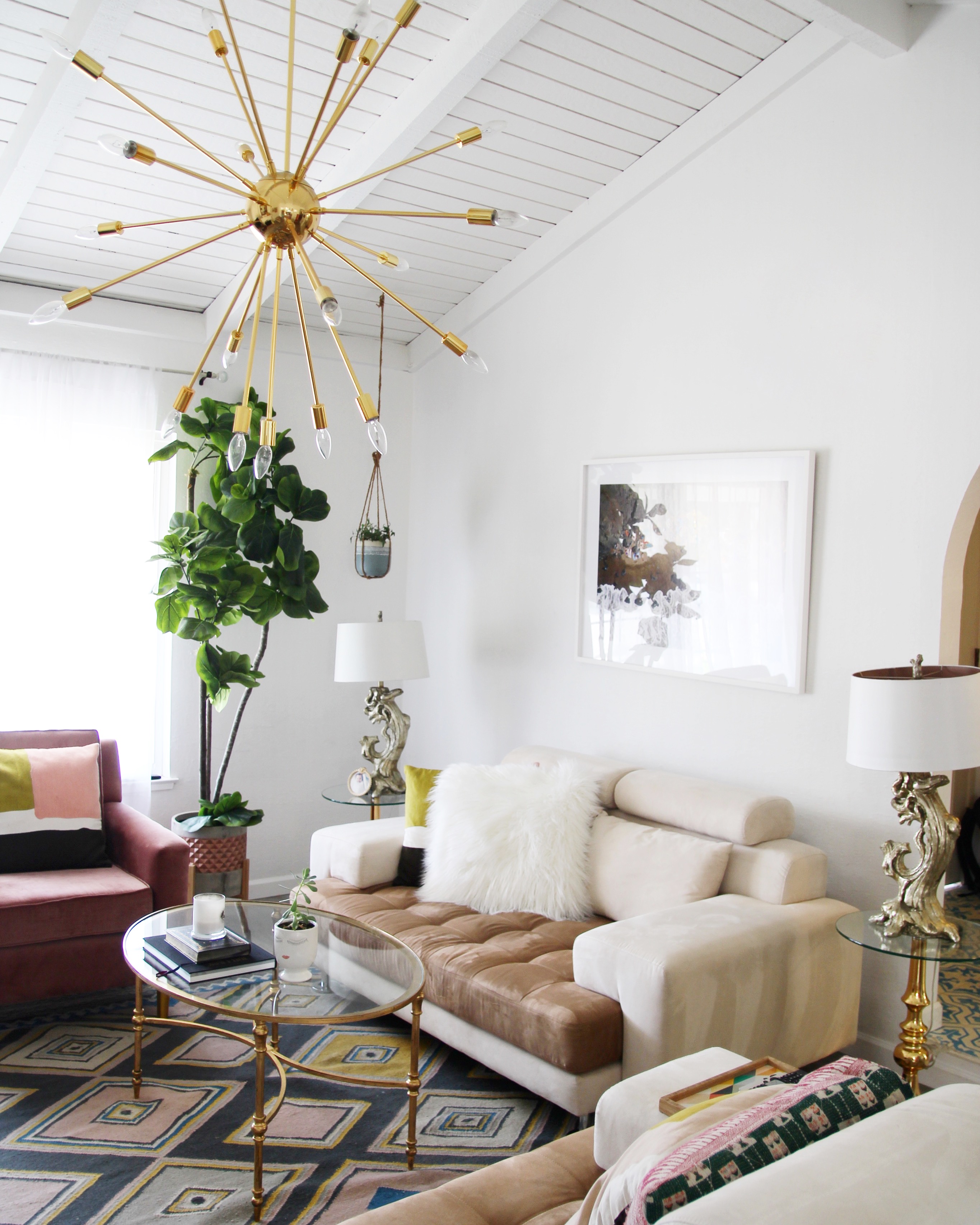 scandinavian style cream and brown couch and loveseat