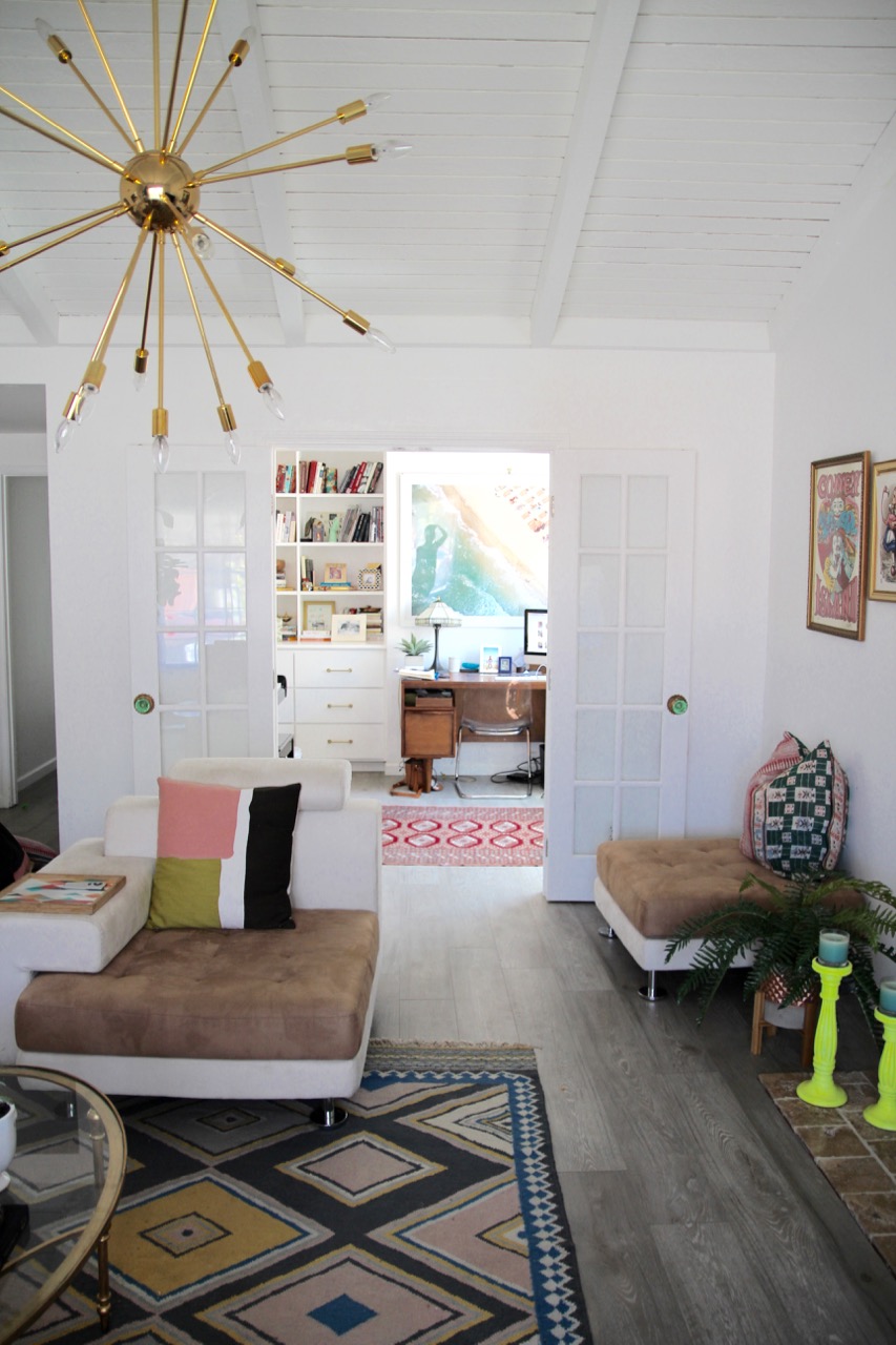 scandinavian style cream and brown couch and loveseat
