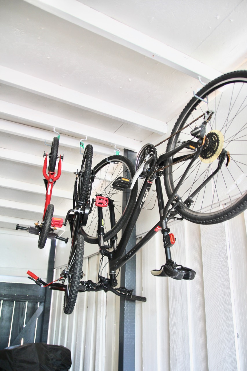 bike hooks hanging from ceiling