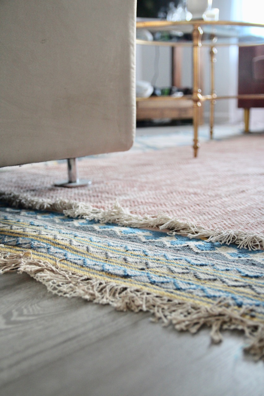 boho layered rugs in the living room