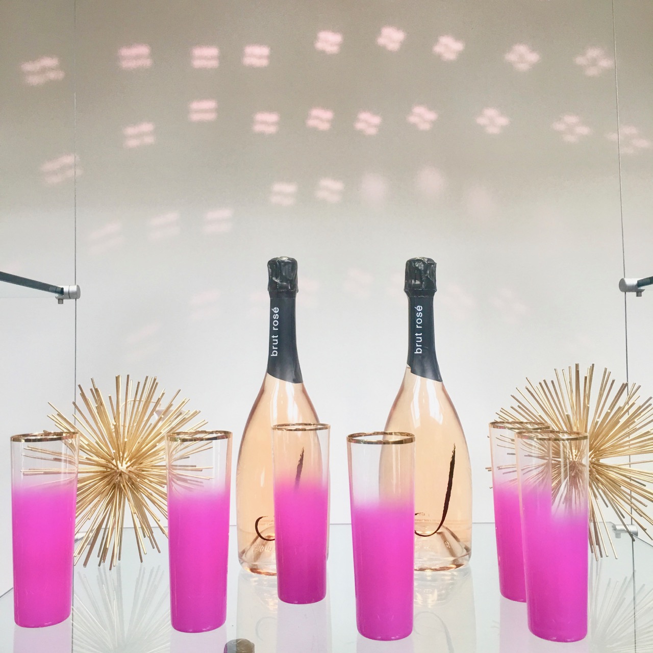 hot pink and gold wine glasses