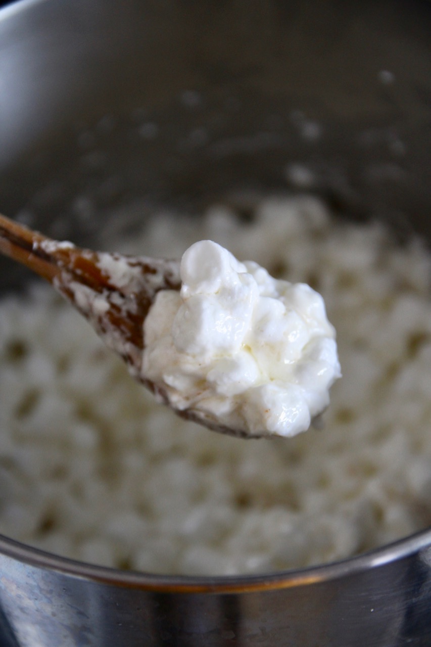 melted marshmallows and butter to make popcorn balls
