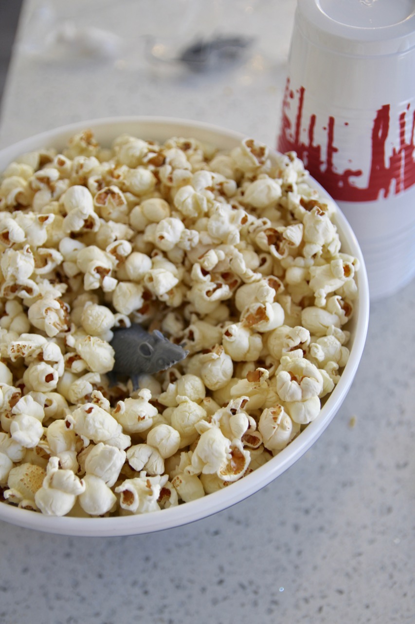 rubber mouse in a popcorn bowl for a halloween party