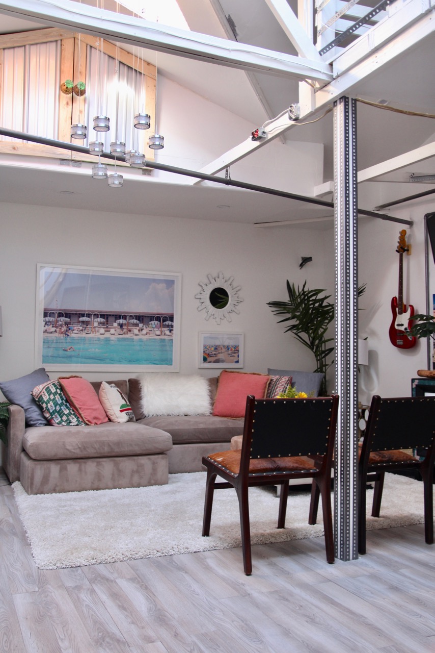 how to transform a garage into a beautiful rec room and multifunctional space