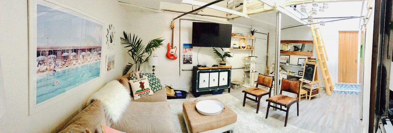 panorama of garage renovation into rec room and studio