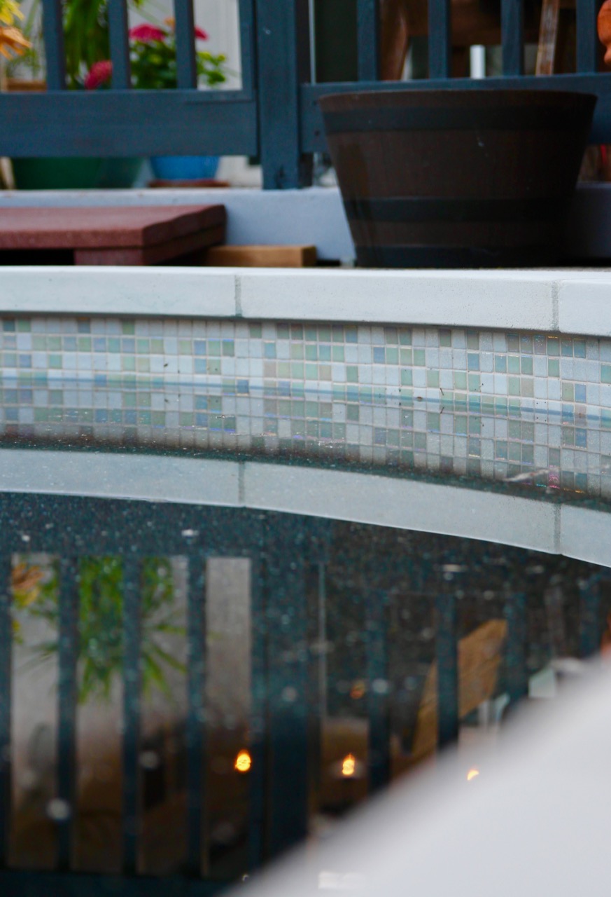 white iridescent pool tiles rainbow