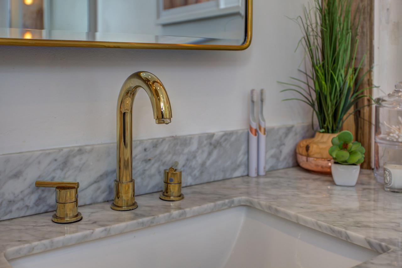 gold gooseneck bathroom faucet