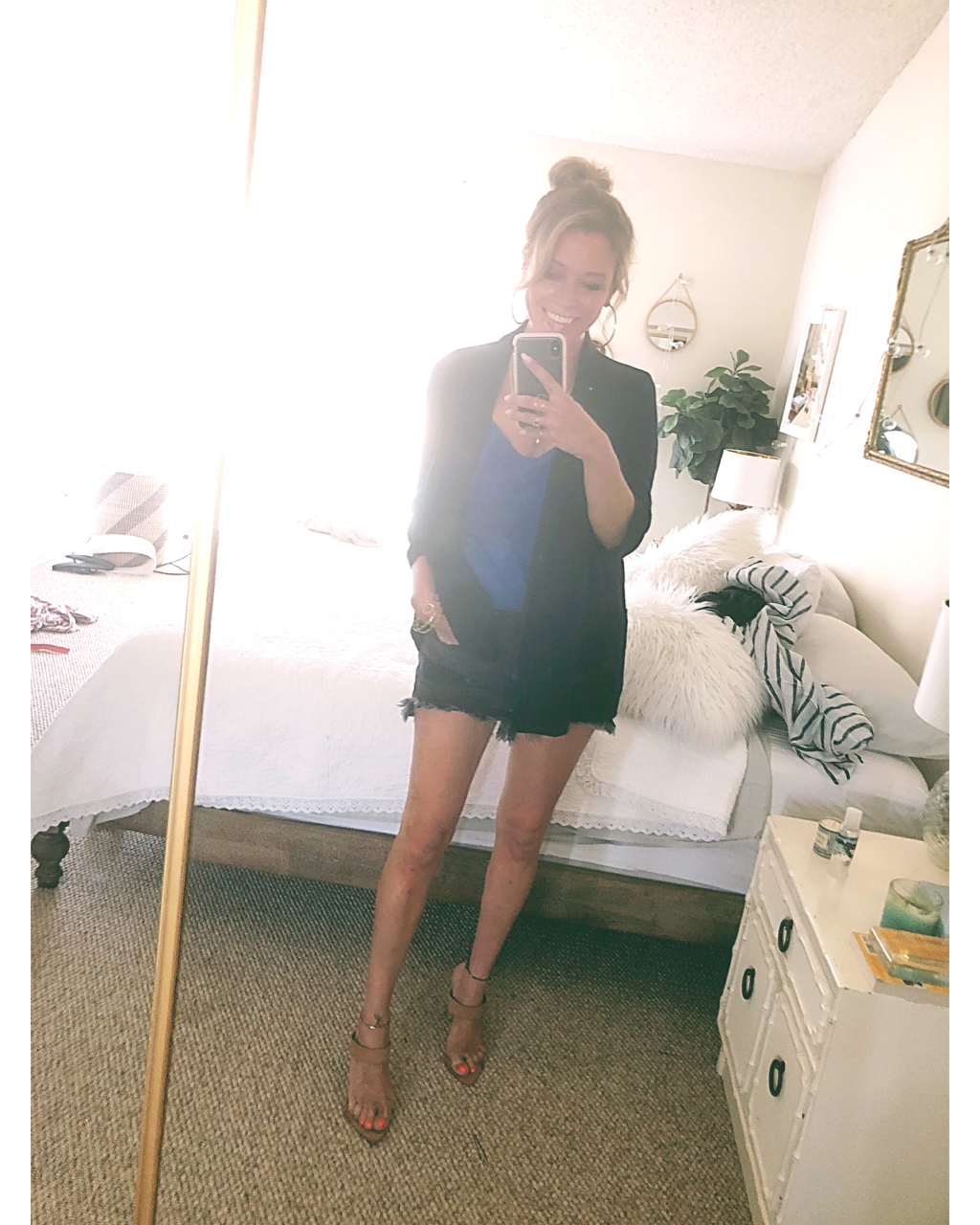 blazer and black shorts